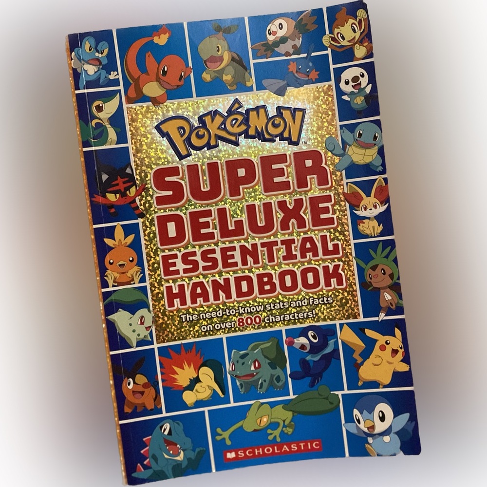Pokemon Super Deluxe Essential Handbook Book Kids Children's Paperback